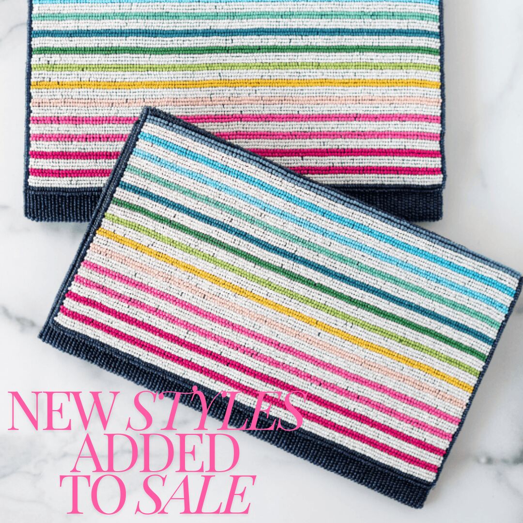 tttxsimplified happy stripe clutch